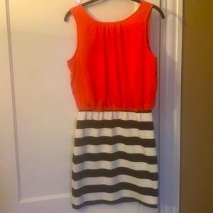 Size large coral and black and white striped dress, never worn